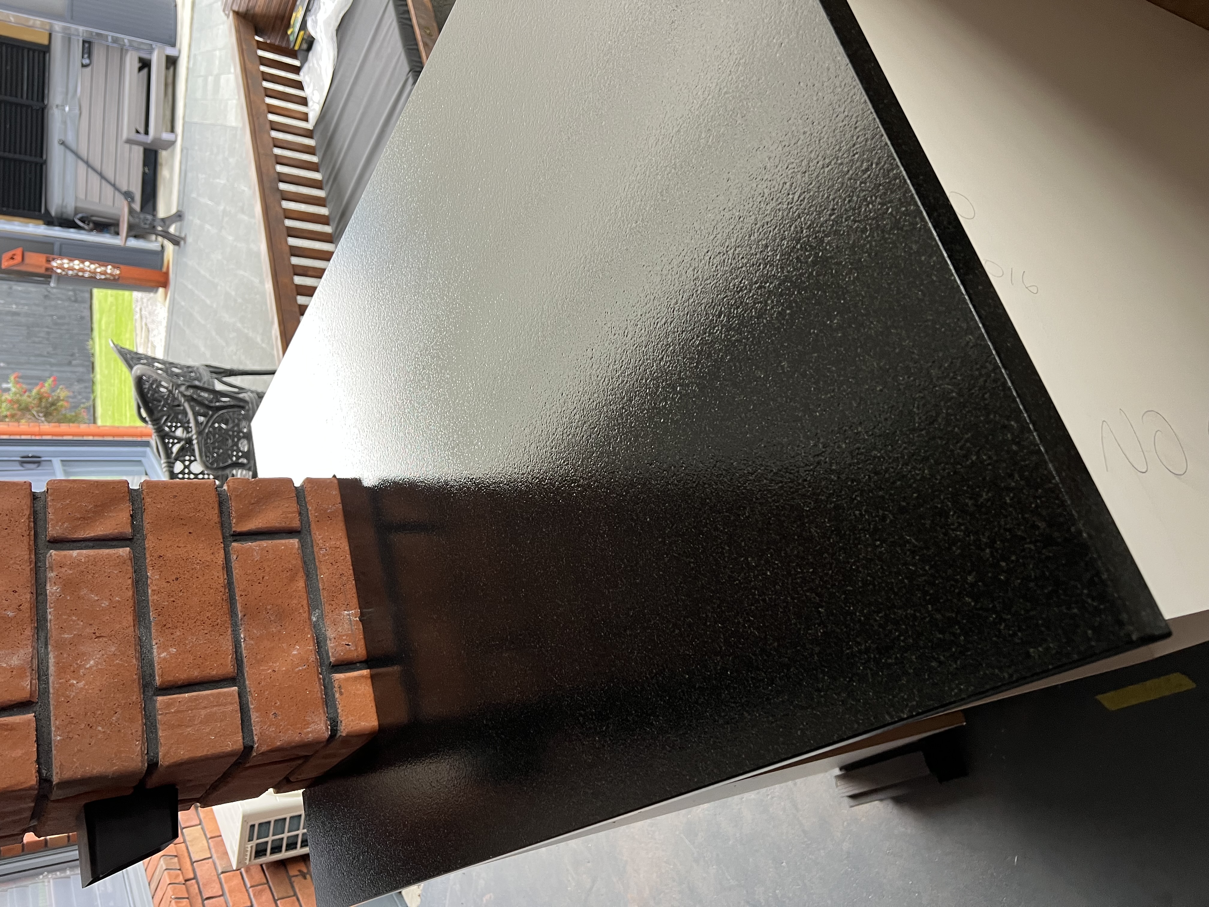 After — Re-seal Absolute Black Granite